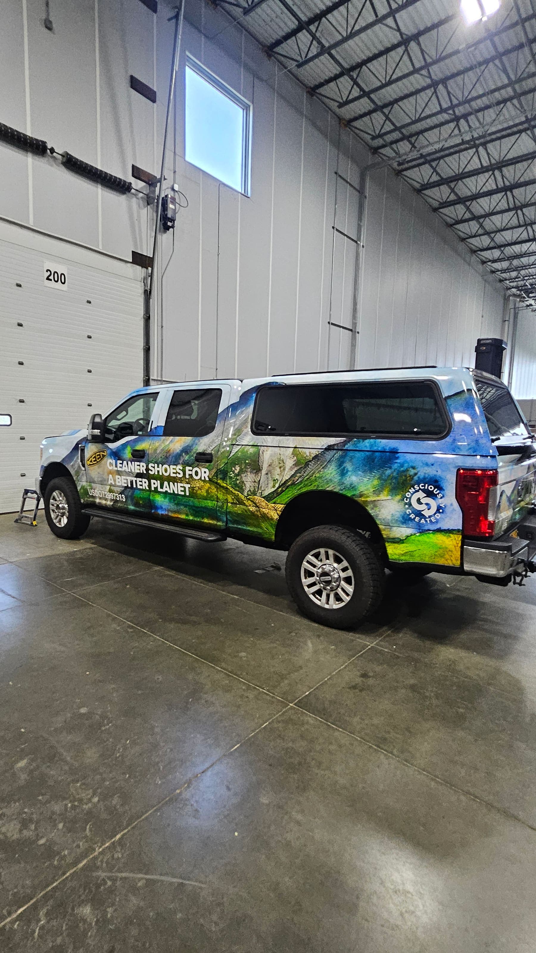 Ford F-250 in a full mountain-landscape wrap for KEEN
